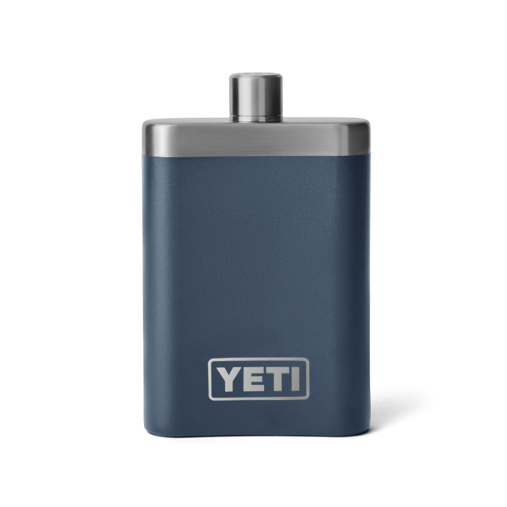 The front view of a navy blue YETI flask. From the YETI barware collection.