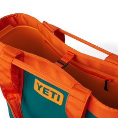 YETI Camino Carryall 35 2.0 Tote Bag in the color orange and teal, from YETI Crossover collection.