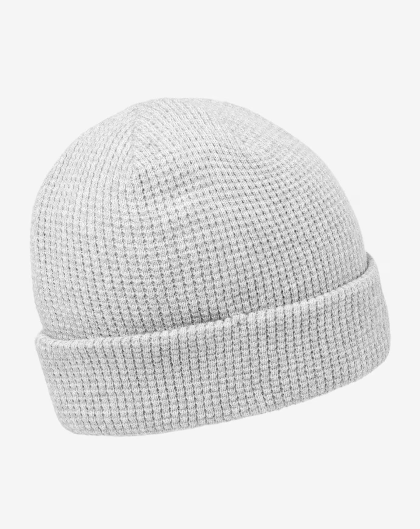 Grey waffle beanie with a brown TravisMathew logo.