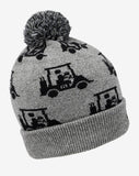 Grey beanie with a palm ball on the top. The beanie has the TravisMathew logo on the front, with the TravisMathew guy drinking in a golf cart logo all around the beanie.