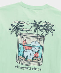 Men's Whiskey Fish Short Sleeve Tee, showing the Vineyard Vines logo, with a cocktail glass with ice cubes and fish inside.