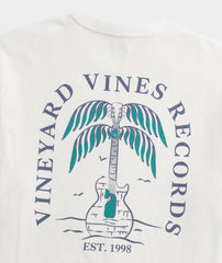 Close up view of the back graphic on the Men's Guitar Palm Short Sleeve Pocket Tee.
