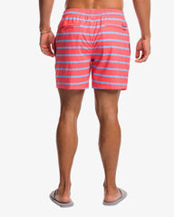 The back view of the Southern Tide Bayshore Stripe Printed Swim Trunk by Southern Tide - Sunkist Coral