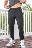 Burlebo men's performance joggers in black.