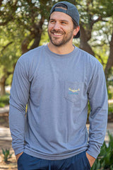 Front view of the Burlebo fish flag t-shirt with a fish on the chest pocket. 
