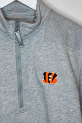 The zipper of a Vineyard Vines shelp shirt, next to the Cincinnati Bengals "B" logo on the chest.