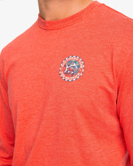 The detail view of the Southern Tide Heather Plaid Skipjack Medallion Long Sleeve T-Shirt by Southern Tide - Heather Charleston Red