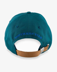 Green men's hat with Southern Tide on the back in blue, with a brown adjustable strap.